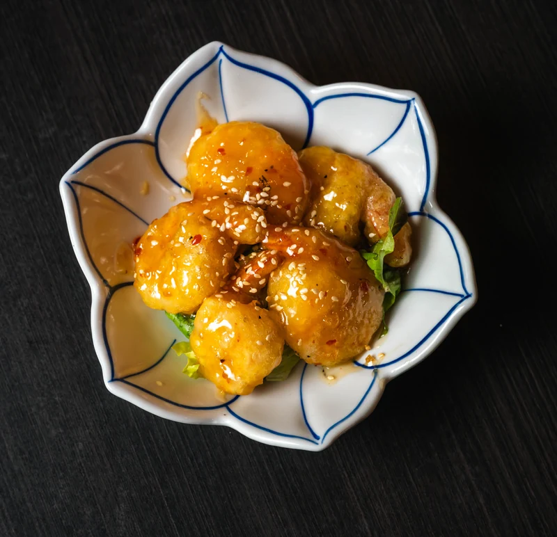 Honey mayo shrimp plated at Kon'ya Japan, a Japanese restaurant in Nolan Hill, Calgary